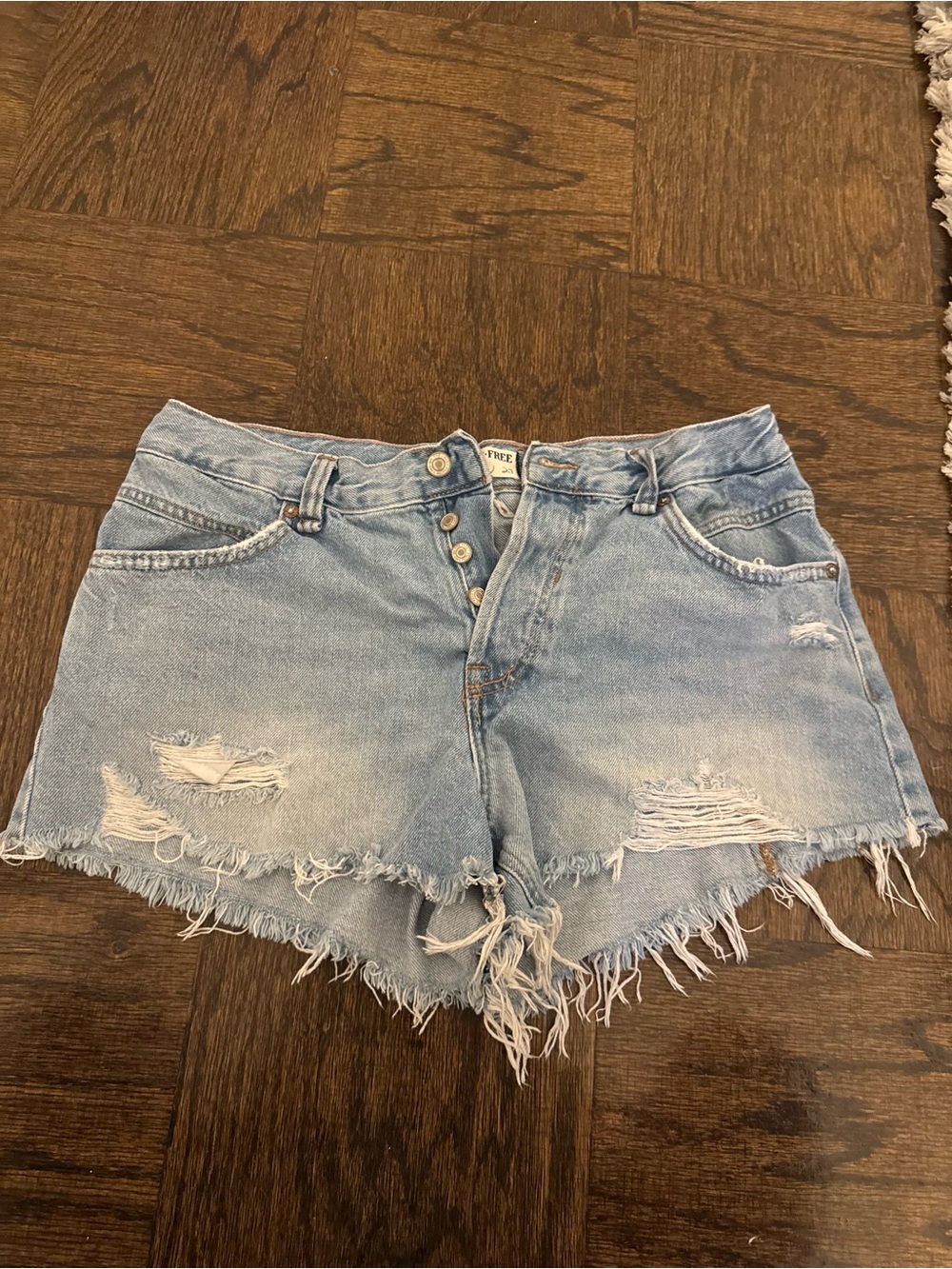 We The Free Light Blue Distressed Denim Cutoff Shorts